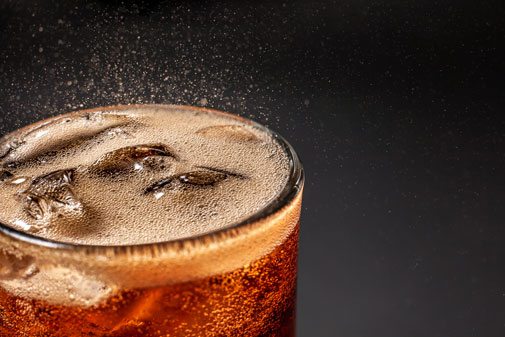 cola with ice in glass